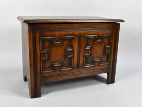 A Mid 20th Century Oak Lift Top Coffer with Two Fielded Panels to Front, Lid Slightly Warped,