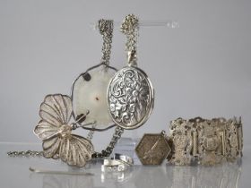A Collection of Silver and White Metal Jewellery to include Large Floral Embossed Silver Locket on