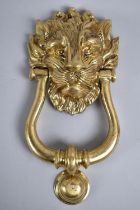 A Reproduction Brass Lion Mask Door Knocker, 23cms High