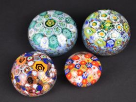 Four Various Millefiori Glass Paperweights