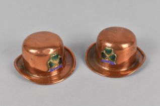 Two Miniature Irish Souvenirs in the form of Copper Bowler Hats with Enamelled Shamrock