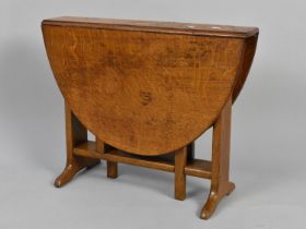 A Small Edwardian Oak Drop Leaf Sutherland Table, 57cms Wide