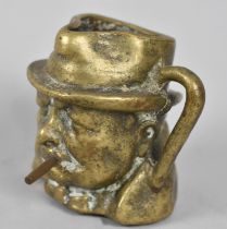 A Cast Brass Jug, Churchill, 7cms High