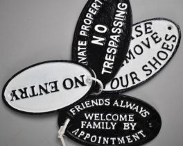 A Collection of Four Oval Painted Cast Metal Signs, Plus VAT