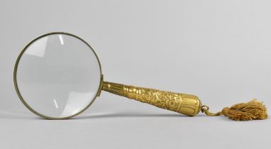 A Brass Handled Desktop Magnifying Glass, 23cms Long