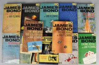 A Collection of Eleven James Bond Paperback Books by Pan together with a Copy of Saturday Night and