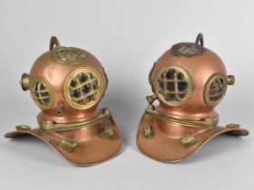 A Pair of Reproduction Models in Copper and Brass Depicting Vintage Divers Helmets, 18cms High