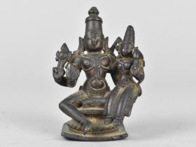 A Late 19th Century Indian Bronze Hindu Shrine Ornament Depicting Hariti with Child on Knee, 7cms