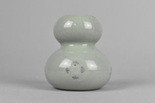 A Chinese Qing Period Celadon Gourd Vase Decorated with Floral Motif Roundles