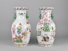 A Pair of 20th Century Chinese Porcelain Famille Rose Vases Decorated with Children at Play in