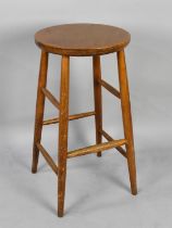 A Circular Topped Stool, 36cms Diameter and 69cms High