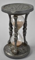 A Reproduction Hourglass, Top and Bottom Inscribed Virtute Protectione 1687, 14cms High