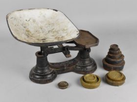 A Pan Scale with Cast Iron Base and Weights