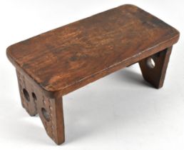 An Indian Carved Wooden Shrine/Altar Table with Folding Legs and Stretcher, 30cmsx15cmsx13.5cms High