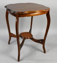 An Edwardian Mahogany Shaped Top Occasional Table on Extended Cabriole Supports, 58cms Square