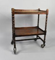 A Mid 20th Century Oak Two Tier Galleried Trolley with Bobbin Supports, 60cms Wide