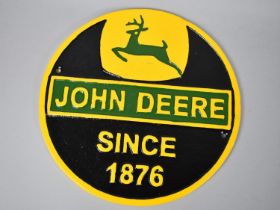 A Cold Painted Cast Metal Circular Sign for John Deere Tractors, 24cms Diameter