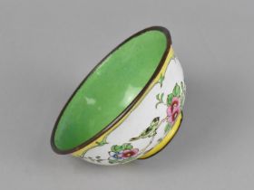 A Chinese Enamel on Copper Bowl Decorated in the Famille Rose Palette with Cartouches on Yellow