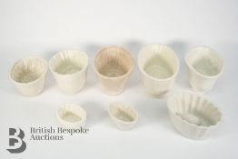 Eight Antique Ceramic Jelly Moulds
