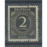 1946 2pf black numeral with extra vertical perf through centre of stamp. U/M, fine. SG 900 var.