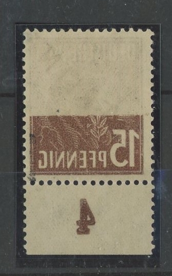 1948 15pf with offset of brown on reverse covering nearly half of the stamp. Mint, fine.