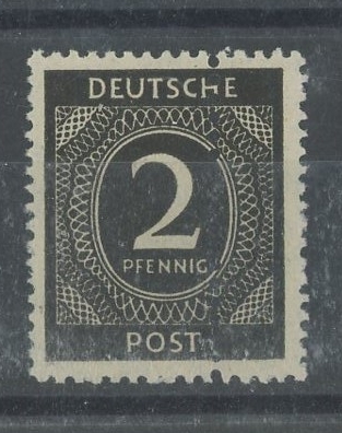 1946 2pf black numeral with extra vertical perf through centre of stamp. U/M, fine. SG 900 var. - Image 2 of 2