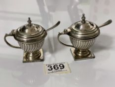 A PAIR OF WHITE METAL FLUTED CONDIMENTS AND TWO SPOONS, STAMPED R&CO, 168 GRAMS.
