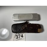 A MINOX COMPLAN 1 : 3,5 F = 15 MM, MINATURE SPY CAMERA WITH LEATHER CASE.