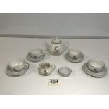 A CHILDS PORCELAIN ELEVEN PIECE TEA SET.