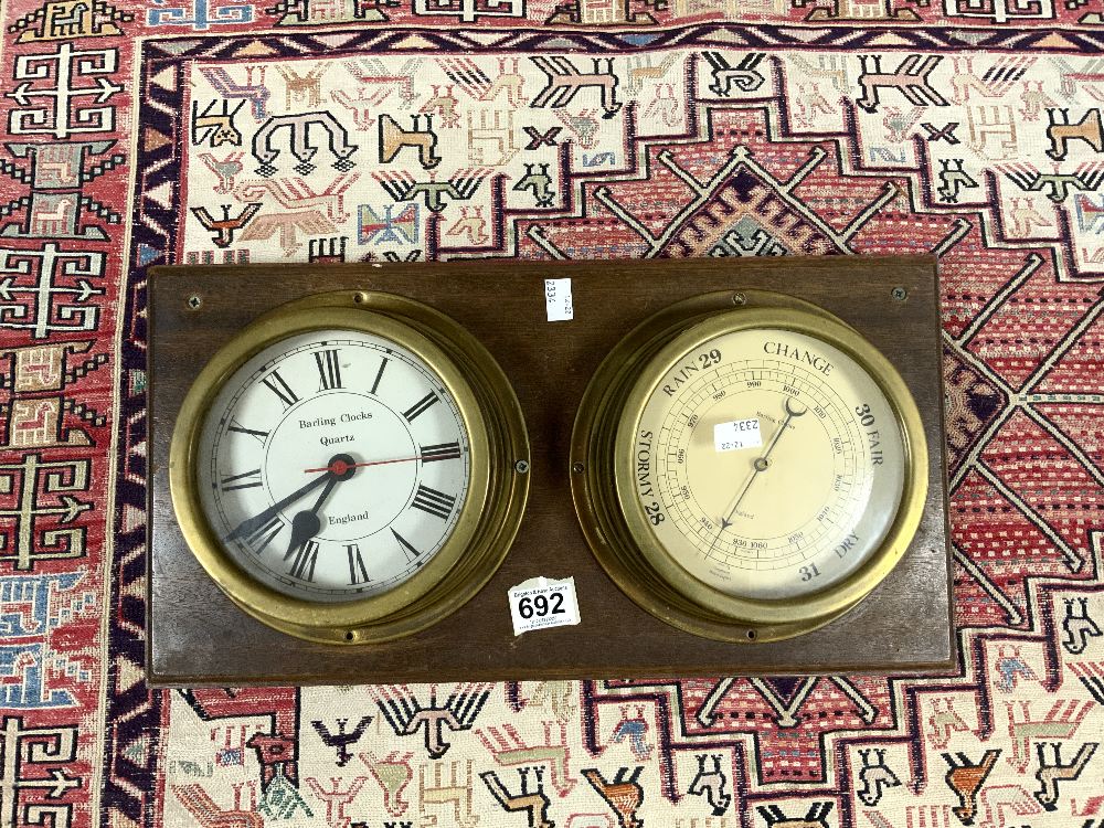 A REPRODUCTION BRASS CLOCK BAROMETER.