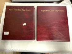 TWO ALBUMS OF ROYAL MAIL FIRST DAY COVERS.
