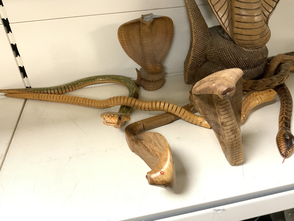 A CARVED WOODEN FIGURE OF A COBRA, AND THREE CARVED ARTICULATED WOODEN COBRAS. - Image 3 of 4