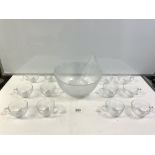 A MOULDED GLASS LEAF DESIGN PUNCH BOWL AND TWELVE MATCHING CUPS.