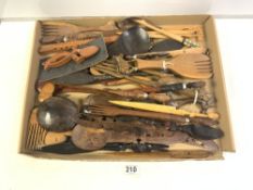 A QUANTITY OF TRIBAL WOODEN SPOONS, FORKS, COOMBS, KNIVES ETC.