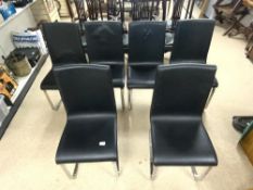 A SET OF SIX ITALIAN MADE RETRO DESIGN CHROME AND BLACK LEATHER DINING CHAIRS.