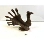 A CARVED WOODEN TURKEY KNIFE HOLDER.