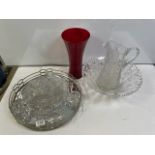 A CUT GLASS WATER JUG, CUT GLASS PUNCH BOWL, AND OTHER GLASSWARE, AND A CIRCULAR MIRRORED PLATED