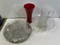 A CUT GLASS WATER JUG, CUT GLASS PUNCH BOWL, AND OTHER GLASSWARE, AND A CIRCULAR MIRRORED PLATED