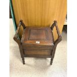 A LATE VICTORIAN WALNUT COMMODE.