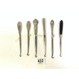 ANTIQUE SILVER AND EBONY BUTTON HOOKS VARIOUS DECORATION ON THE HANDLES