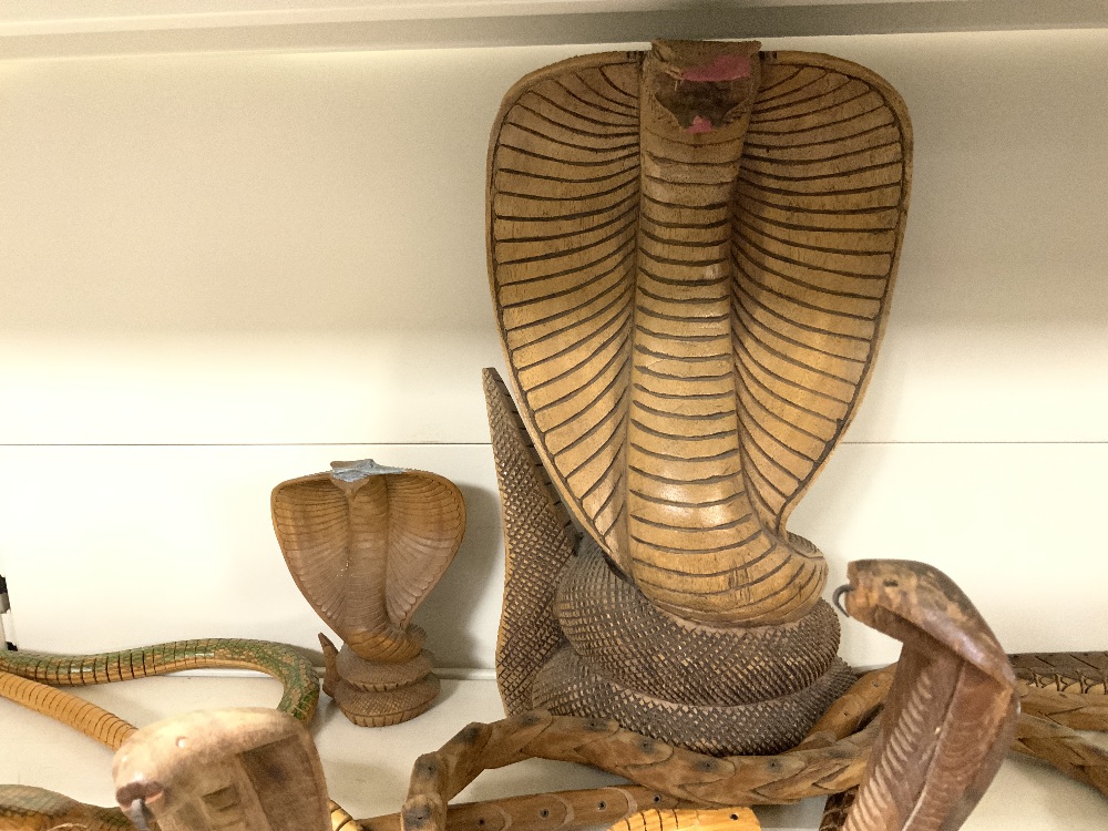 A CARVED WOODEN FIGURE OF A COBRA, AND THREE CARVED ARTICULATED WOODEN COBRAS. - Image 2 of 4