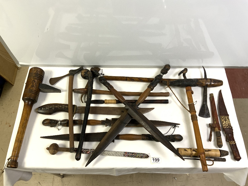 A QUANTITY OF TRIBAL SPEARS, KNIVES AND IMPLEMENTS.