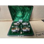 SET OF FOUR LATE VICTORIAN HALLMARKED SILVER OVAL SALTS RAISED ON PAD FEET WITH SPOONS BY JOHN ROUND