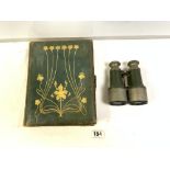 A VICTORIAN ART NOUVEAU LEATHER PHOTOGRAPH ALBUM, AND A PAIR OF VICTORIAN BINOCULARS.