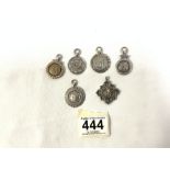 SIX HALLMARKED SILVER CRICKET FOBS 1920S AND 1940S