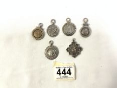 SIX HALLMARKED SILVER CRICKET FOBS 1920S AND 1940S