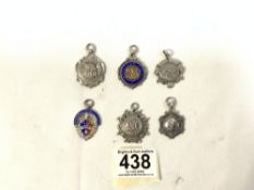 SIX HALLMARKED SILVER FOBS SOME WITH ENAMEL EARLY 20TH CENTURY