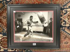 BOXING MUHAMMAD ALI SIGNED TRAINING PHOTOGRAPH WITH CERT OF AUTH FRAMED AND GLAZED 68 X 58CMS