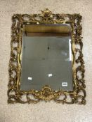 ORNATE GILTWOOD STYLE WALL MIRROR. 59X75.