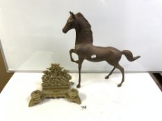 ORNATE BRASS DOUBLE INKSTAND/LETTER RACK, AND A BRASS FIGURE OF A PRANCING HORSE, 44CMS.